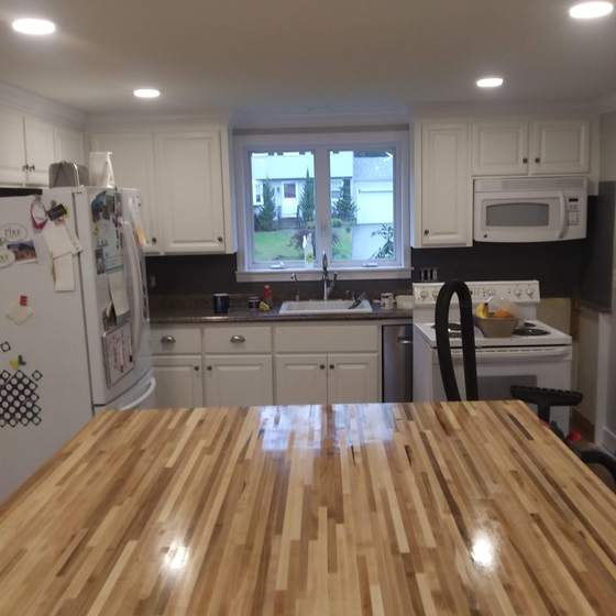 Kitchen with repainted white cabinets