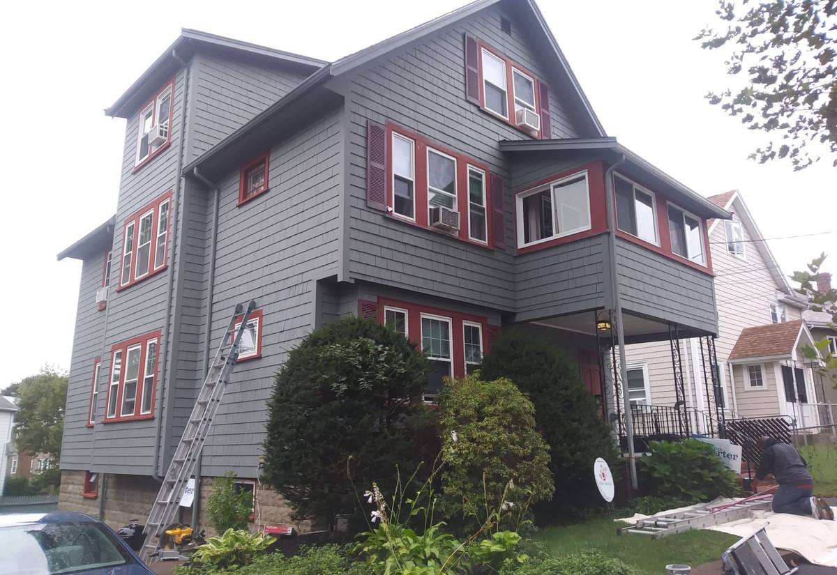 Triple-decker in charcoal and brick red