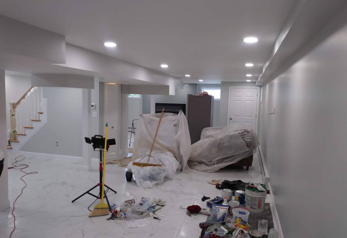 Finished basement with new drywall and paint